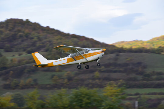 A light single-engine sport plane taking off