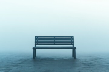A solitary bench sits in a misty, empty space, evoking feelings of loneliness and contemplation.