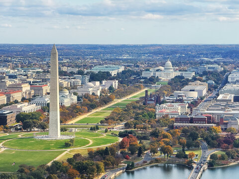 Aerial view of The Washington DC. Washington Monument and Congress.
The Washington Memorial, the National Mall, and the U.S. Congress can be seen side by side.