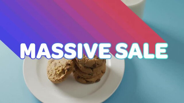 Massive sale text animation over cookies on white plate with blue background