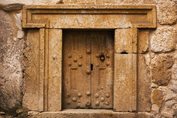 The door of an ancient tomb, in Israel.