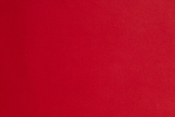 A red background with a white line, textured origami paper backdrop