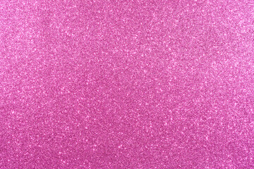 A pink background with glittery texture