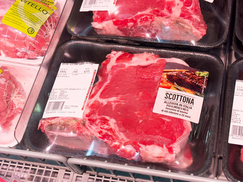 Fresh italian beef cuts in packaging at supermarket display