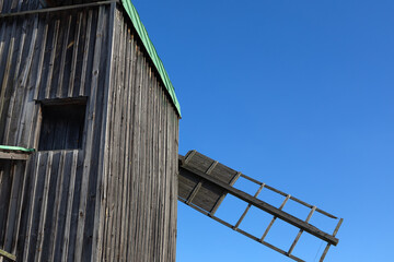 Old wooden windmill. Museum of Pies in Ukraine.
