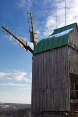 Old wooden windmill. Museum of Pies in Ukraine.