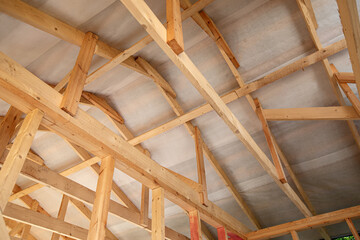 Unfinished frame house. Building process
