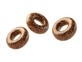Three Delicious Pretzels in Mid-Air against transparent Background