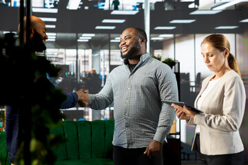 Company CEO attends meeting to talk about new business vision with executive board member, doing handshake. Worker greeting manager, shaking his hand, pitching investment strategy © DC Studio