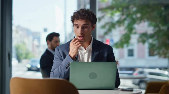 Happy accountant working laptop remotely pondering panoramic restaurant closeup