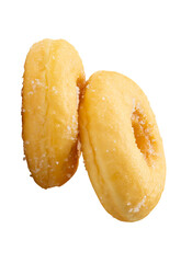 Side view of brown sugar glazed cinnamon donuts in stack isolated with clipping path in png file format
