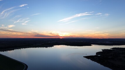 Aerial view of orange sunset over the lake