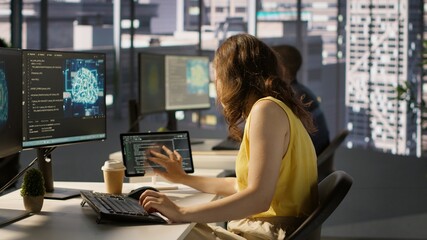 Admin developing artificial intelligence machine learning APIs solving complex problems. Woman training AI predictive models capable of handling resource intensive tasks, camera A