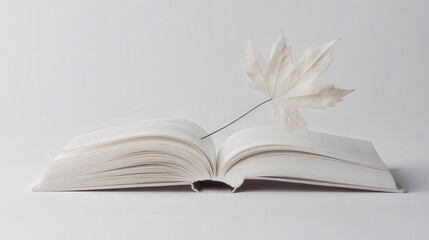 Obraz premium book publication scene with a detailed maple plant,