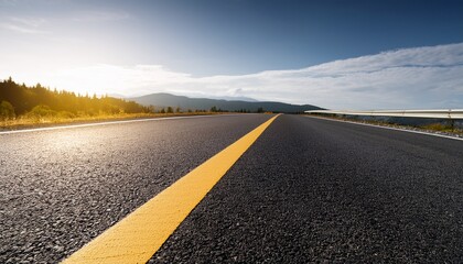 Naklejka premium asphalt road with yellow line
