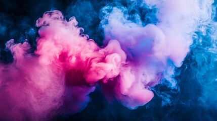 Fototapeta premium Colorful explosion of pink and blue smoke