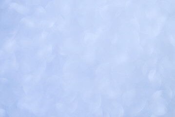 Light blue abstract background with soft light and bokeh effect