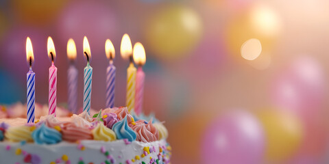 Close Up of a Birthday Cake with Colorful Candles and Frosting
