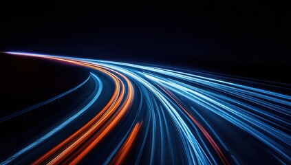 Abstract Light Trails on a Highway at Night with a Dynamic Blend of Blue and Orange Colors Conveying Speed and Motion in a Modern Urban Setting