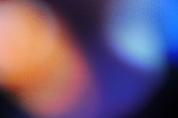 Colorful lens flare on black background.