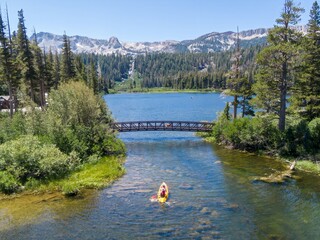 Aerial view of two people kayaking on Twin Lakes, Mammoth Lakes, California, USA. They are enjoying...