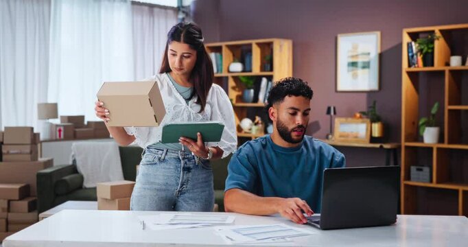Couple, shipping and small business for logistics, online and inventory management on tablet in home office. Ecommerce, man and woman on laptop for sales, box procurement and freelance distribution