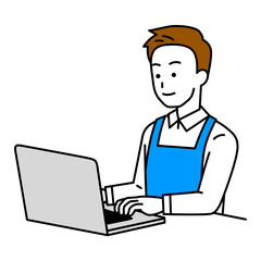 ノートパソコンを操作するエプロン姿の男性