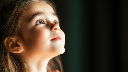 Fototapeta premium Dreamy Girl Hopeful Child Innocent Face Upward Gaze Childhood Pure Joyful Expression