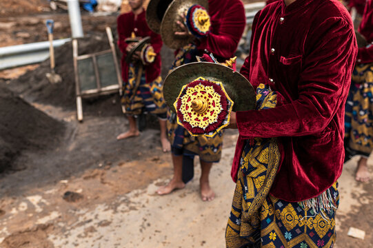 Traditional musicians playing cymbals at wedding ceremony, Lombok, Indonesia
