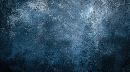 Obraz premium A minimalist dark blue background with soft, glowing highlights for contrast.