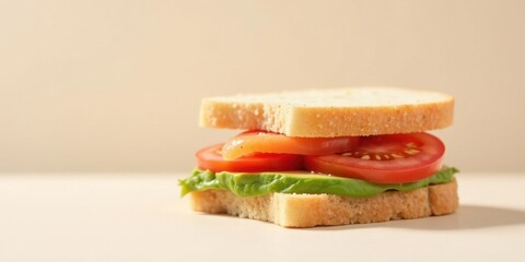 A delectable sandwich featuring sliced tomatoes, avocado, and salmon on artisan bread, a healthy and visually appealing meal option.