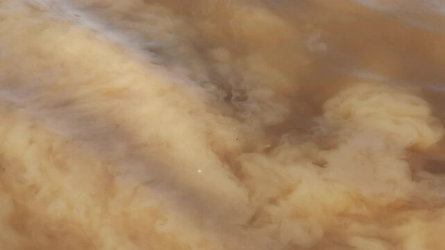 Sediment, mud, and underwater waves circulate in various shapes.