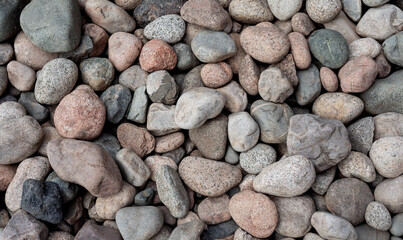 Natural Pebbles And Smooth Stones Background for Texture And Landscape Design