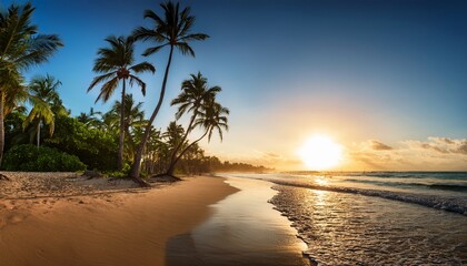 beautiful sunrise over tropical beach and palm trees in dominican republic