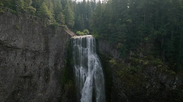 Breathtaking 4K aerial footage of Salt Creek Falls, Oregon's second-highest waterfall at 286 feet, surrounded by lush evergreen forests in Lane County. Captured in October.