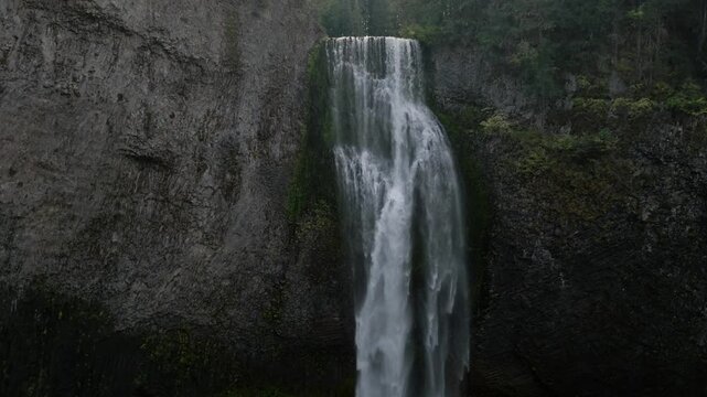 Breathtaking 4K aerial footage of Salt Creek Falls, Oregon's second-highest waterfall at 286 feet, surrounded by lush evergreen forests in Lane County. Captured in October.