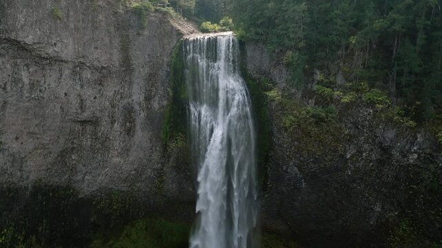 Breathtaking 4K aerial footage of Salt Creek Falls, Oregon's second-highest waterfall at 286 feet, surrounded by lush evergreen forests in Lane County. Captured in October.