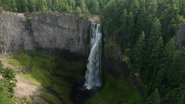 Breathtaking 4K aerial footage of Salt Creek Falls, Oregon's second-highest waterfall at 286 feet, surrounded by lush evergreen forests in Lane County. Captured in October.