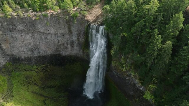 Breathtaking 4K aerial footage of Salt Creek Falls, Oregon's second-highest waterfall at 286 feet, surrounded by lush evergreen forests in Lane County. Captured in October.