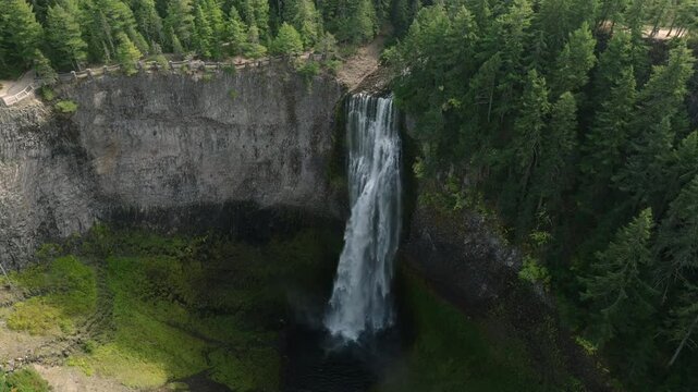 Breathtaking 4K aerial footage of Salt Creek Falls, Oregon's second-highest waterfall at 286 feet, surrounded by lush evergreen forests in Lane County. Captured in October.