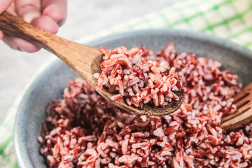 a spoonful of cooked brown rice as a main dish