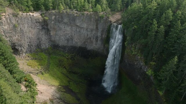 Breathtaking 4K aerial footage of Salt Creek Falls, Oregon's second-highest waterfall at 286 feet, surrounded by lush evergreen forests in Lane County. Captured in October.