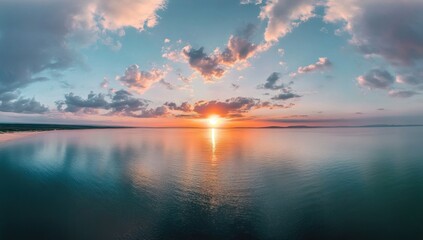 Fototapeta premium Panoramic sunset over tranquil lake.