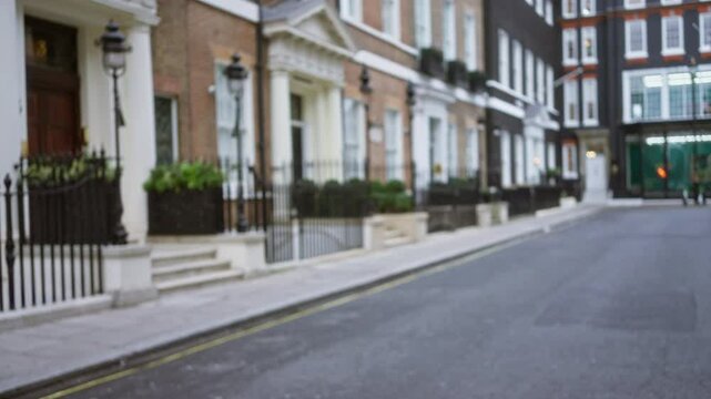 Blurred london street in winter with elegant buildings conveying a peaceful atmosphere with bokeh lighting and architectural charm in the uk cityscape.
