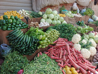 Fresh Market Stall with Colorful Vegetables Displayed