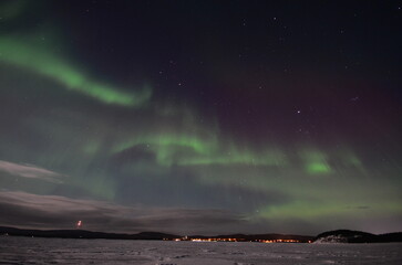 Inari, Finland, is located within the Arctic Circle and has a high chance of seeing the Northern Lights.