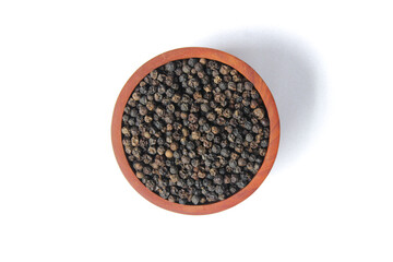Black peppercorns ( Black pepper ) seeds on wooden bowl isolated on white background. Food ingredients. Aromatic spice. Top view