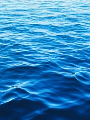 Serene Blue Water Surface Texture - Tranquil ocean, deep blue hues, gentle waves, natural beauty, water texture. Symbolizing peace, serenity, depth, fluidity, and freedom
