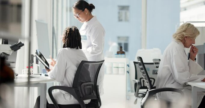 Women, tablet and discussion in lab, research and review for progress, drugs and team at pharmaceutical company. People, science and digital touchscreen for medical project with vaccine development