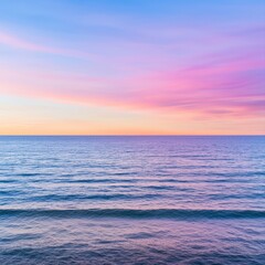 Obraz premium Breathtaking sunset over the calm ocean with vibrant colors painting the sky and reflecting on the water surface